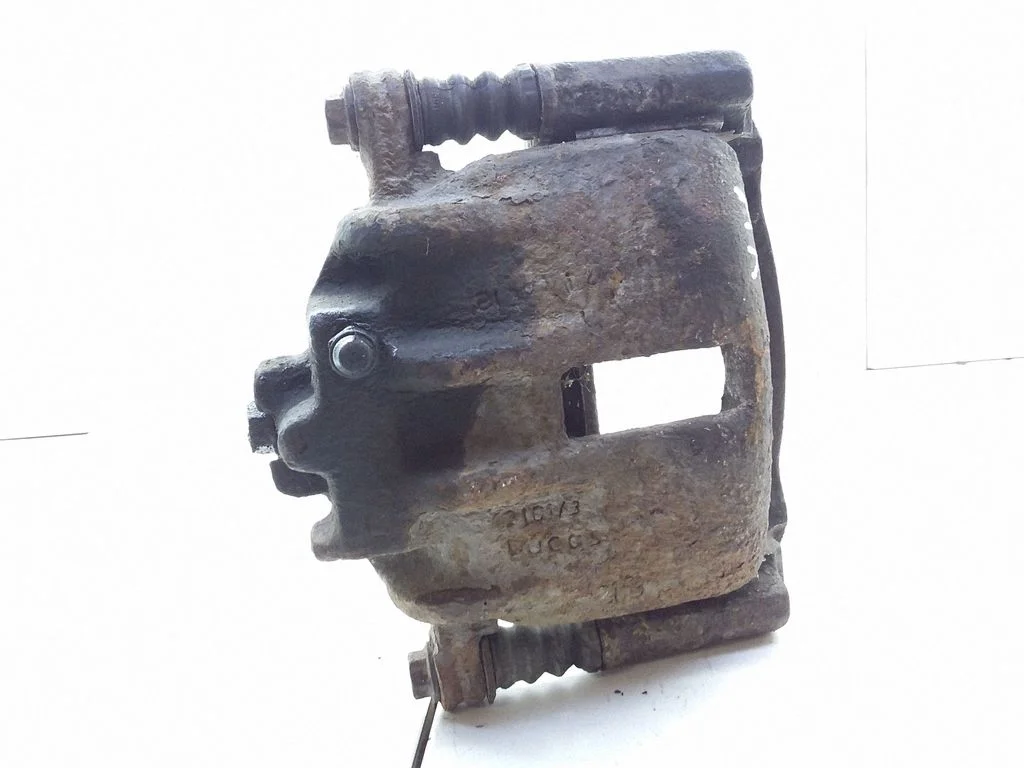 Front brake caliper – front left