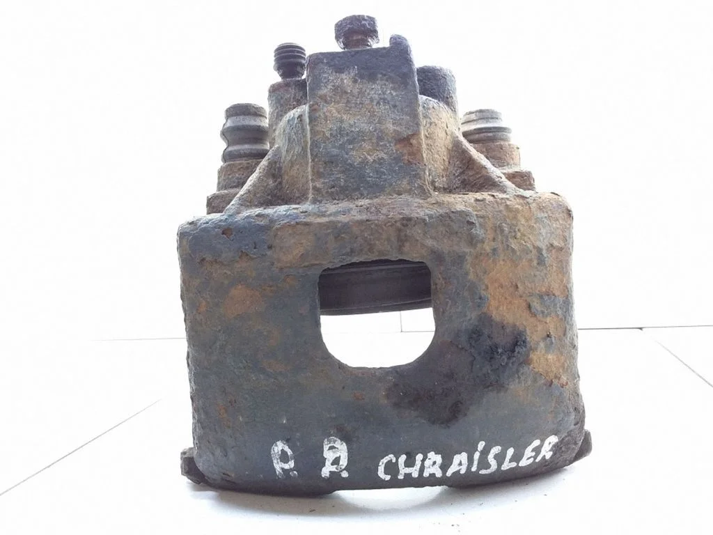 Front brake caliper – Chrysler Grand Voyager III (1995-2000)