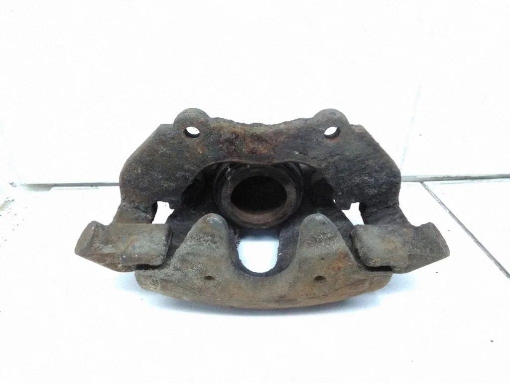 Front brake caliper – left
