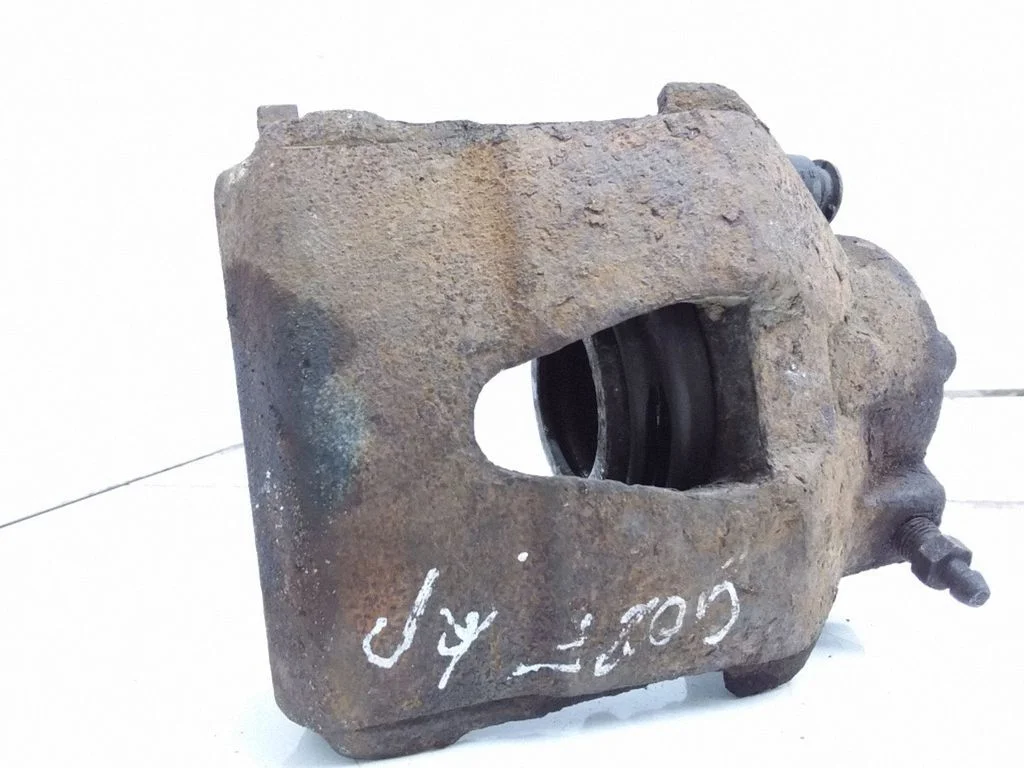 Front brake caliper – left