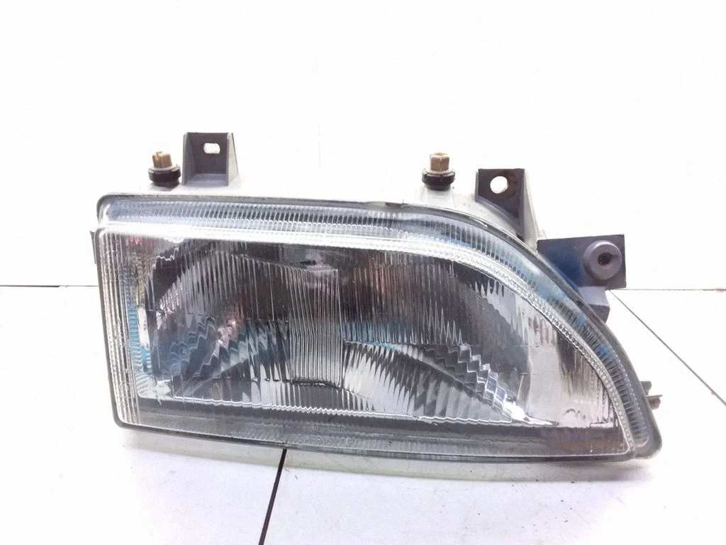 Headlight/headlamp – Ford Escort (1990-1995)