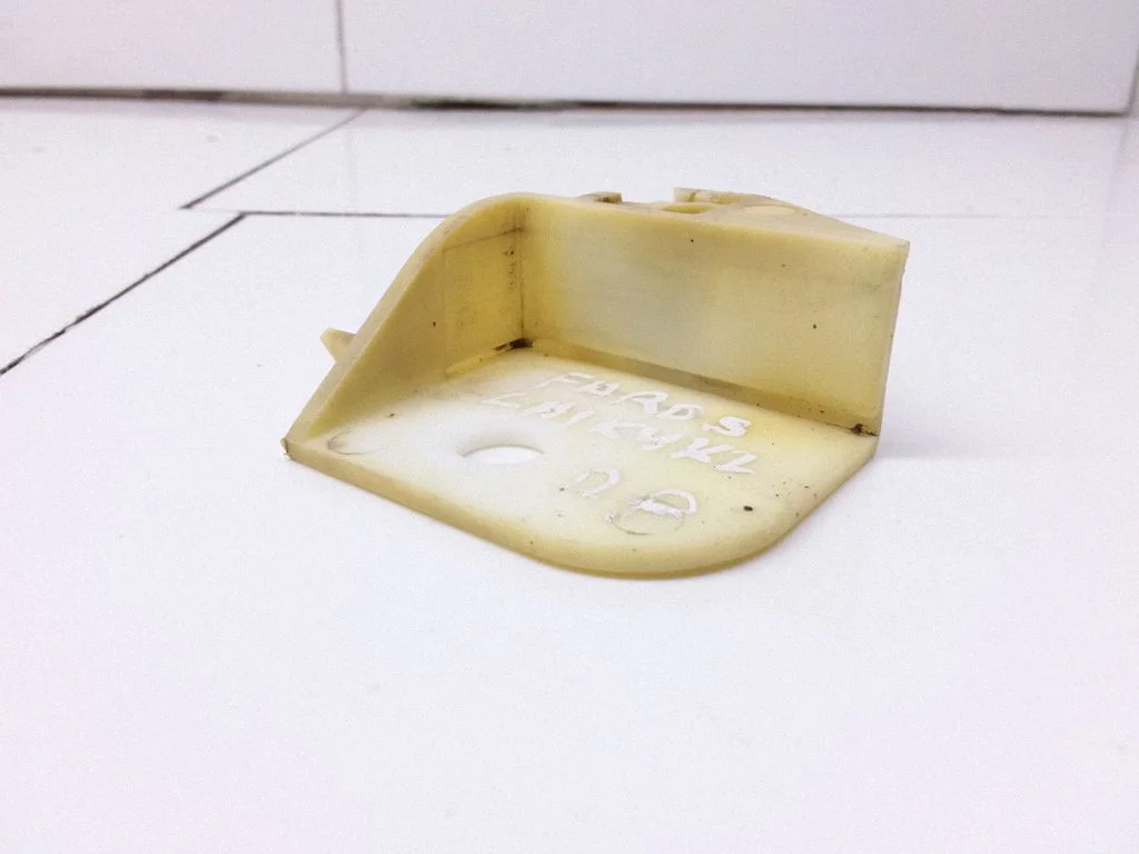 Headlight/headlamp mounting bracket – right