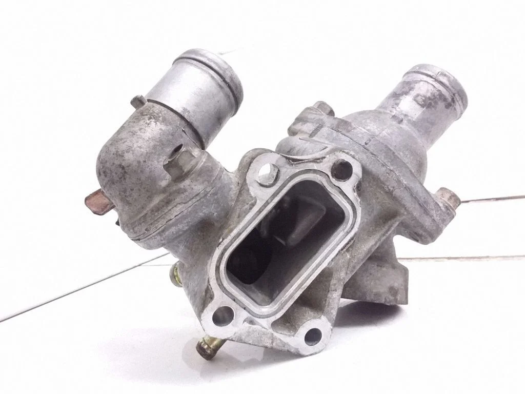 Thermostat/thermostat housing – Chrysler Voyager (1996-2001)