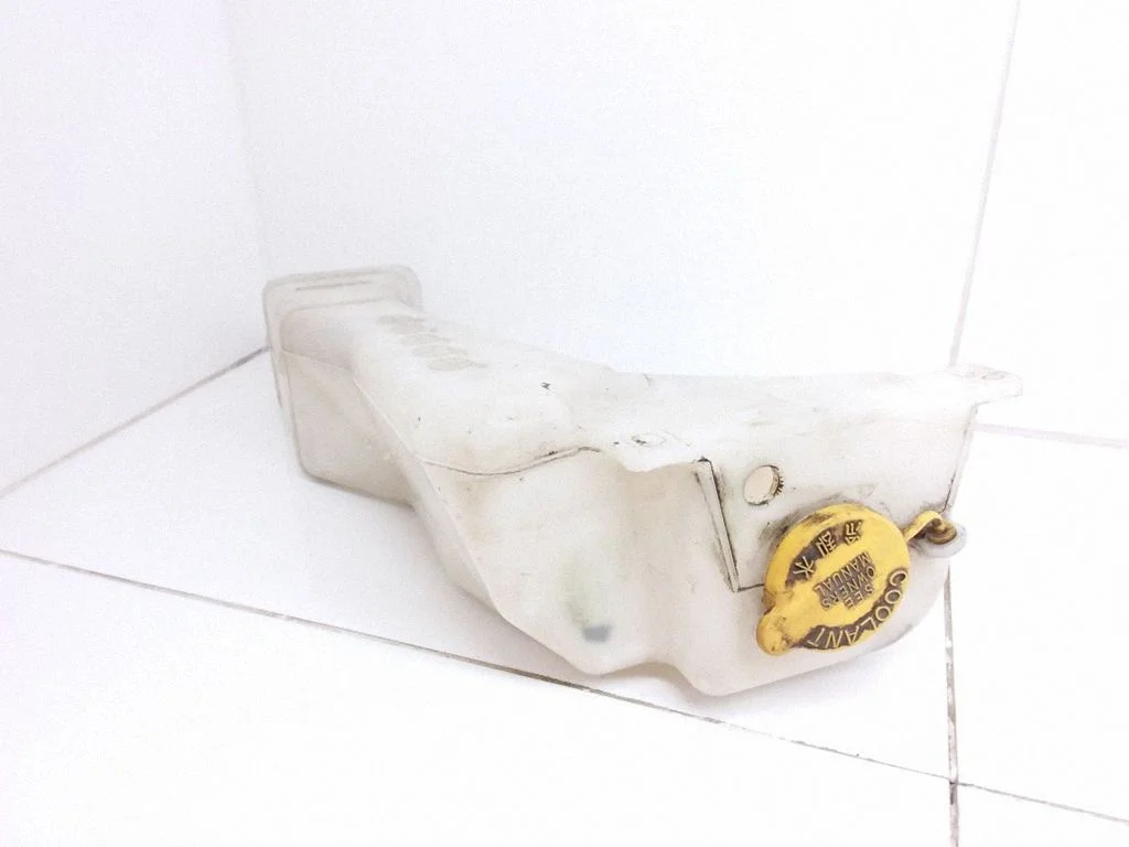 Coolant expansion tank/reservoir – Subaru Forester SF (1998-2000)