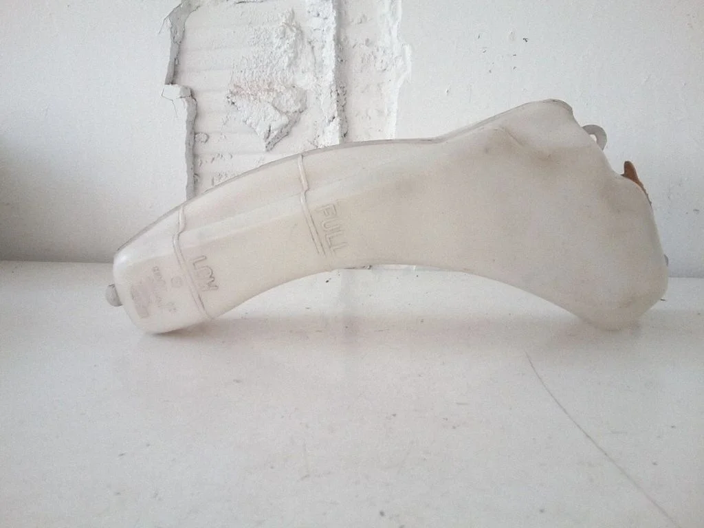 Jahutusvedeliku paisupaak – Subaru Impreza II (2003-2005)