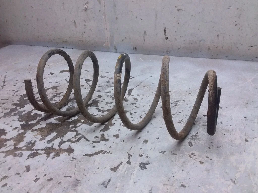 Front coil spring – left