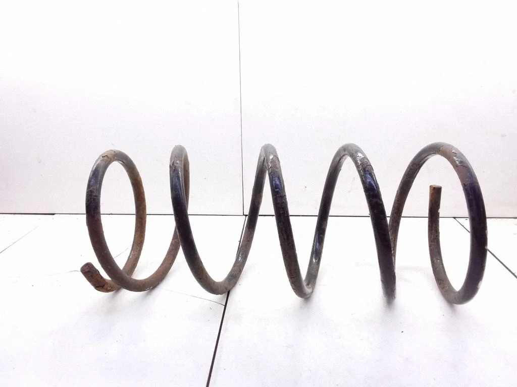 Front coil spring – Mitsubishi Colt (1992-1996)