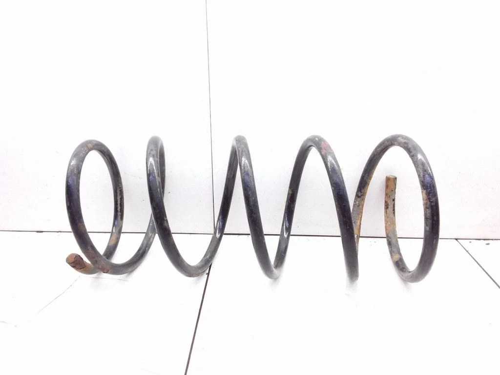 Front coil spring – Mitsubishi Colt (1992-1996)