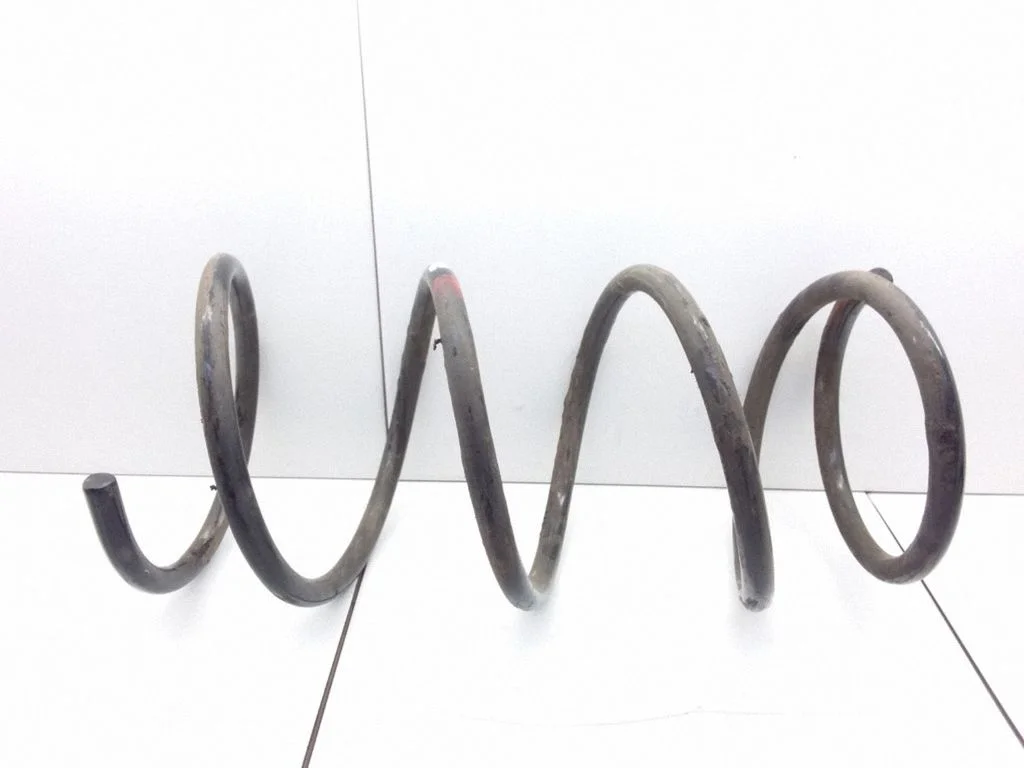 Front coil spring – Chrysler Grand Voyager II (1990-1995)
