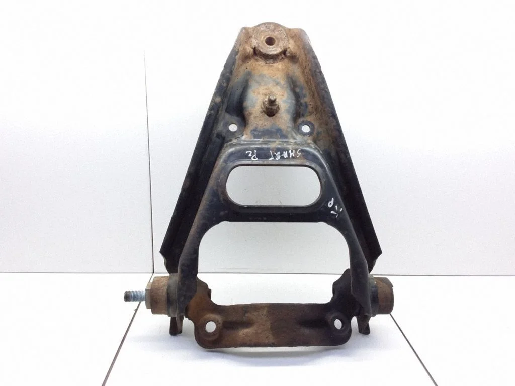 Front lower control arm/wishbone – left