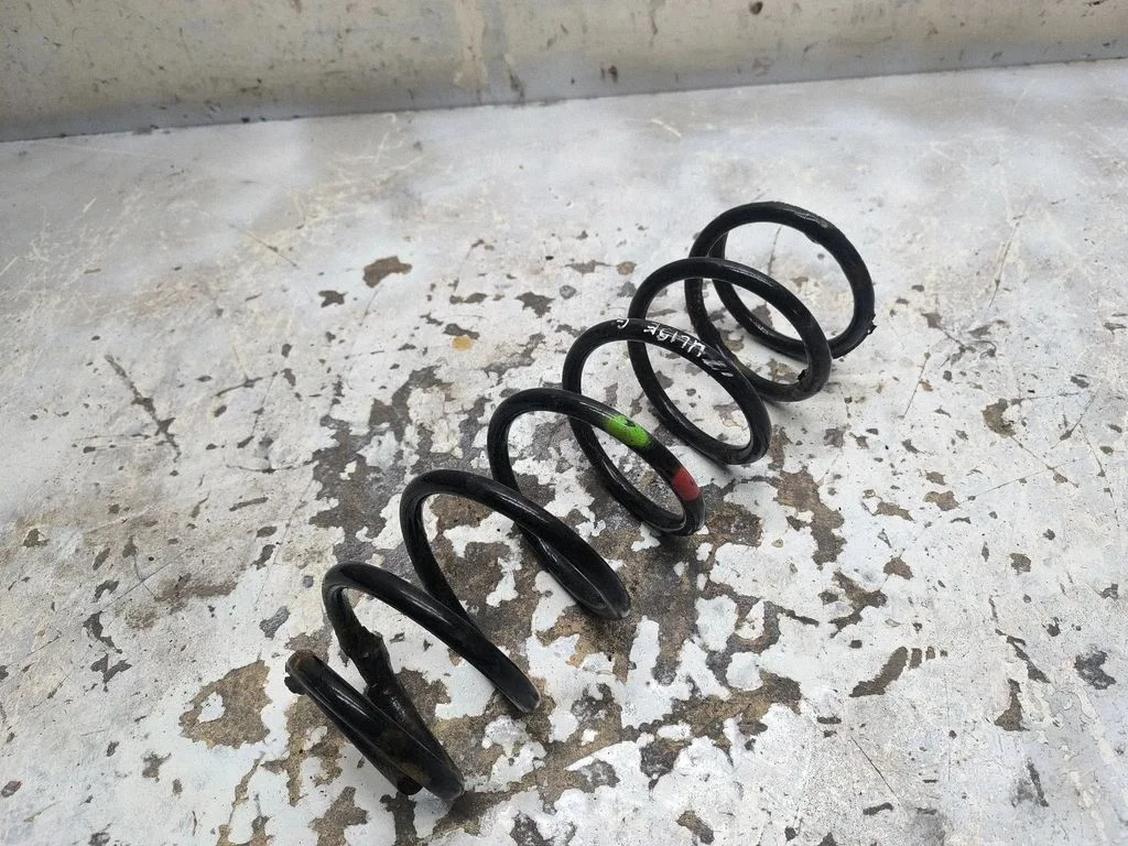 Rear coil spring – right
