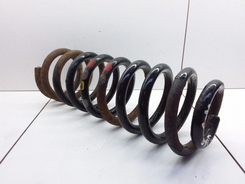 Rear coil spring – Saab 9000 CS (1992-1998)