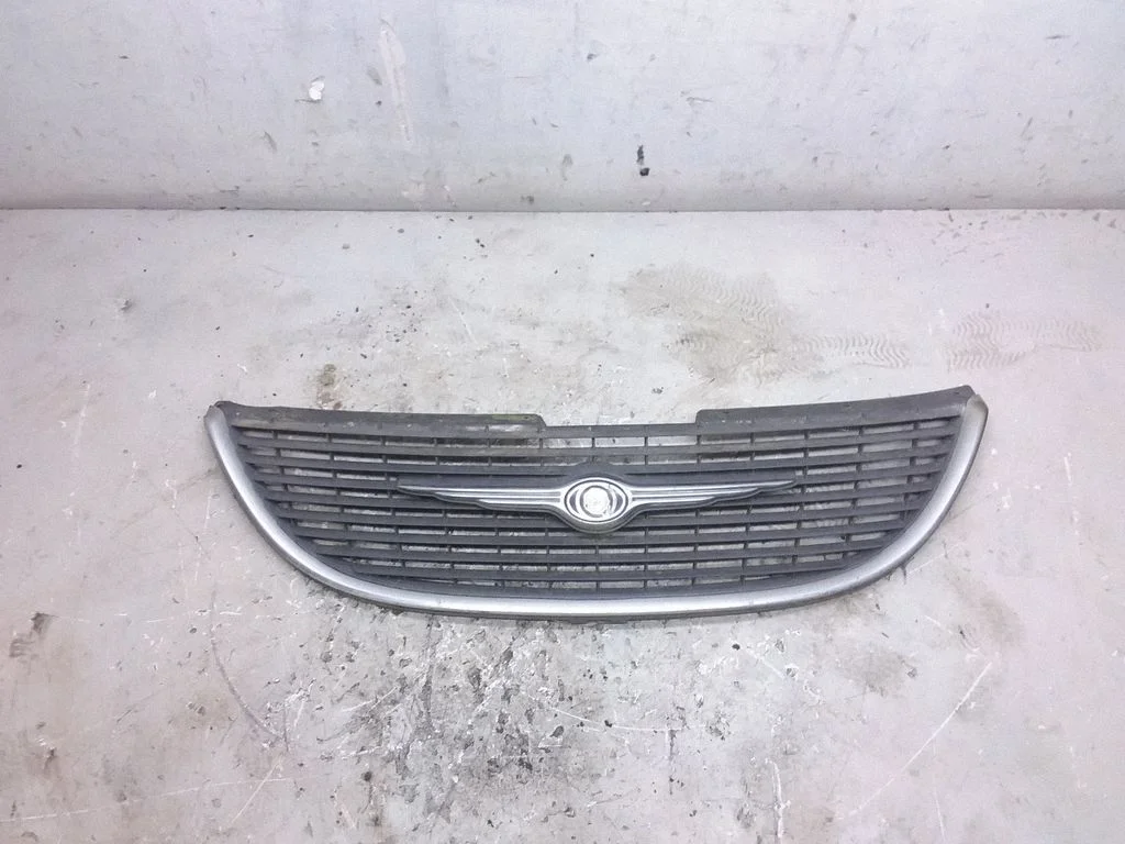 Front bumper upper radiator grill 4857300AA