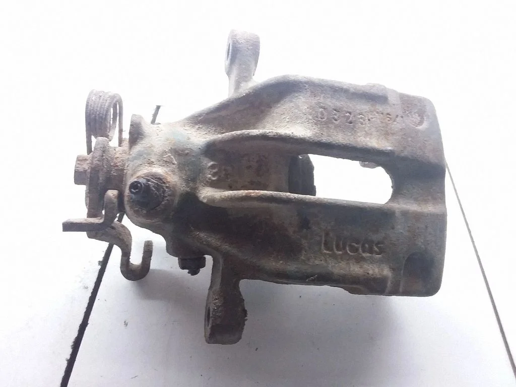Rear brake caliper – right