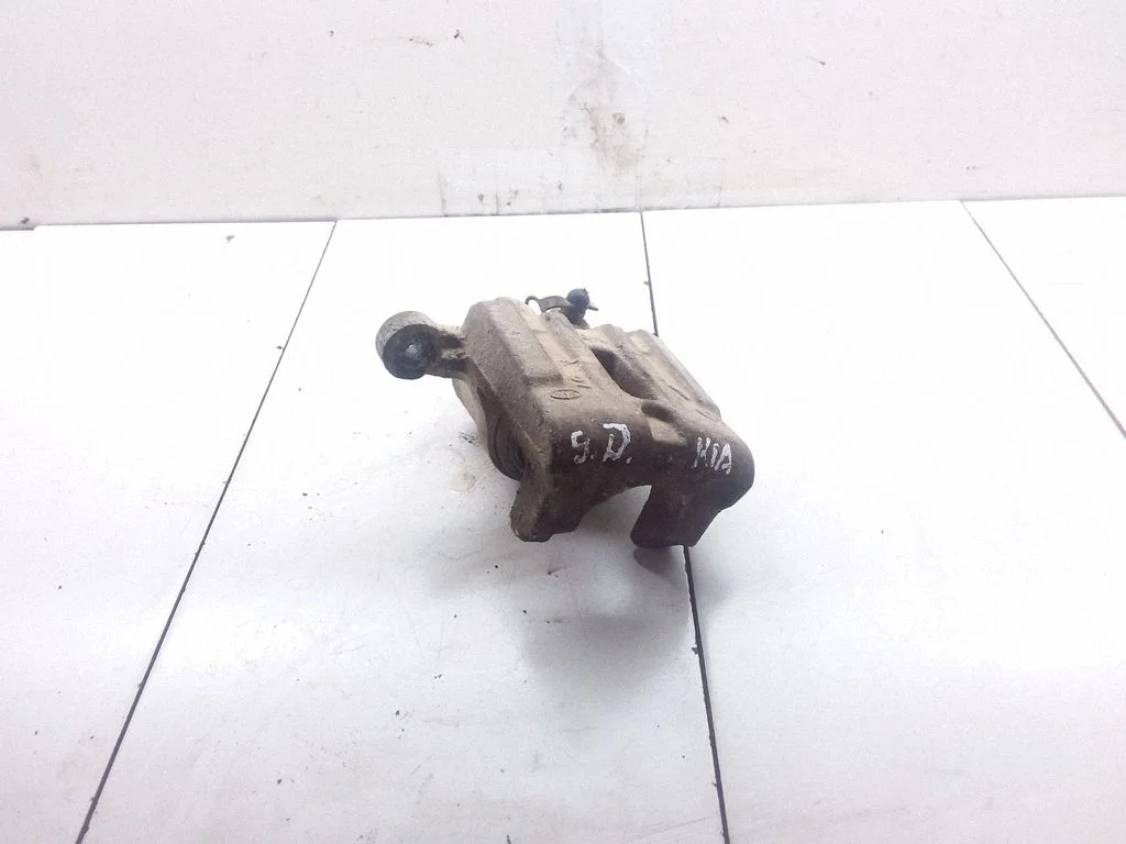 Rear brake caliper – right