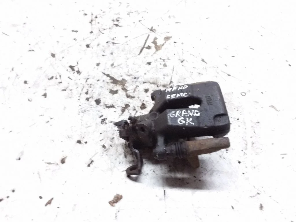 Rear brake caliper – rear left
