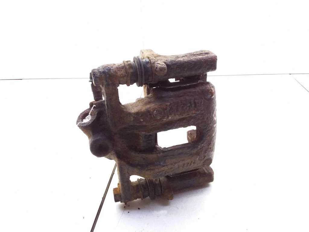 Rear brake caliper – rear left
