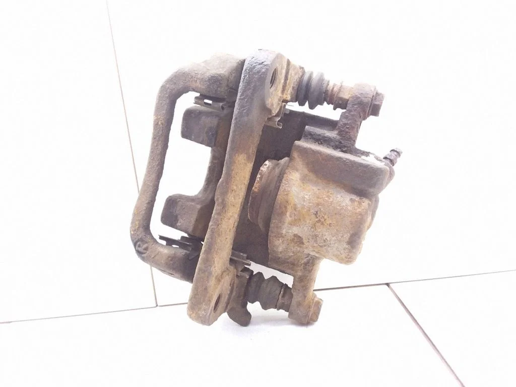 Rear brake caliper – right