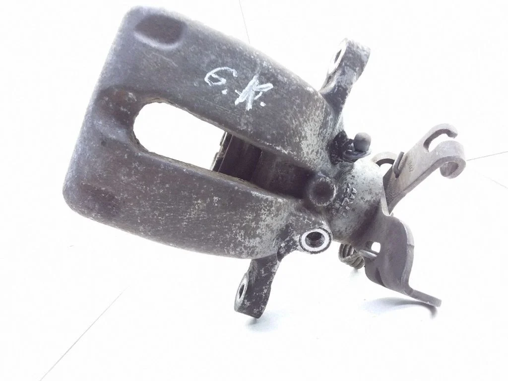 Rear brake caliper – left