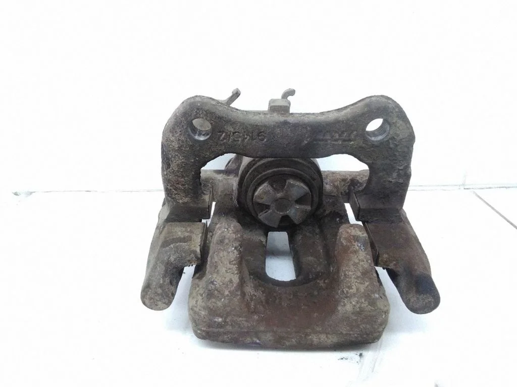 Rear brake caliper – right