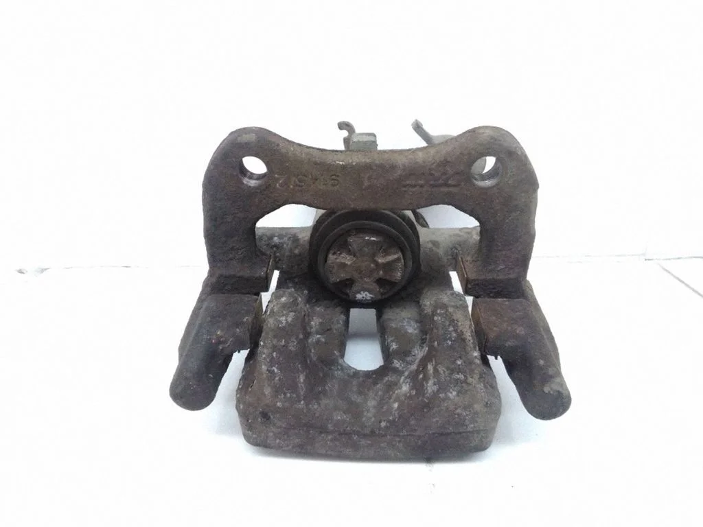 Rear brake caliper – left