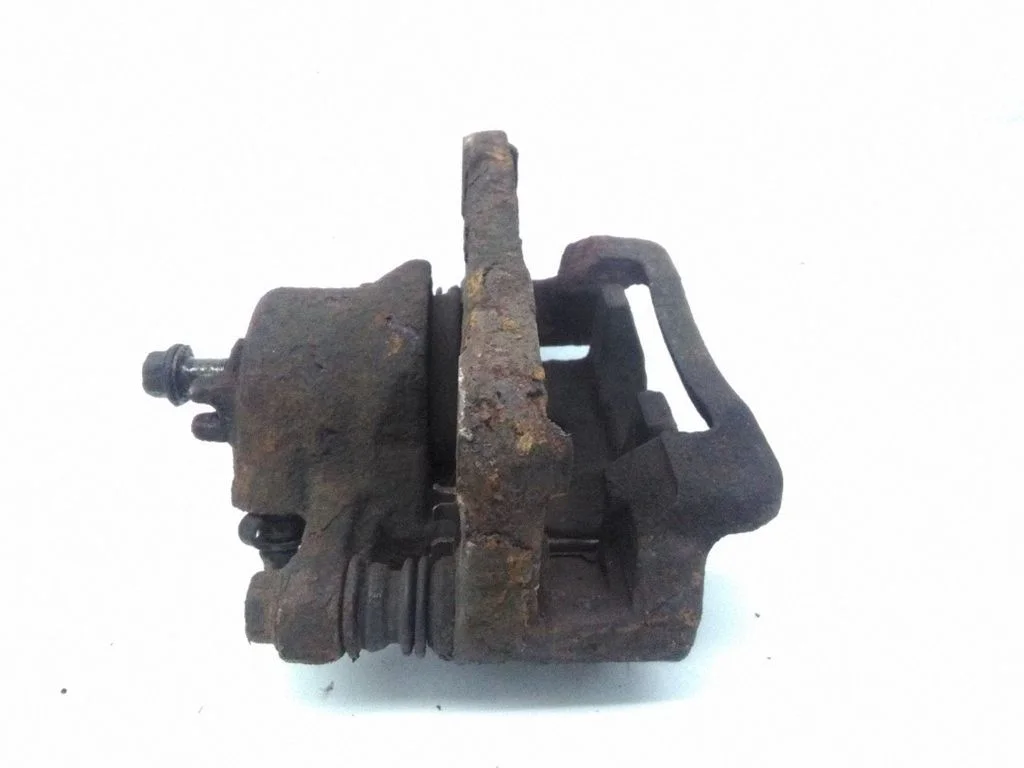 Rear brake caliper – left