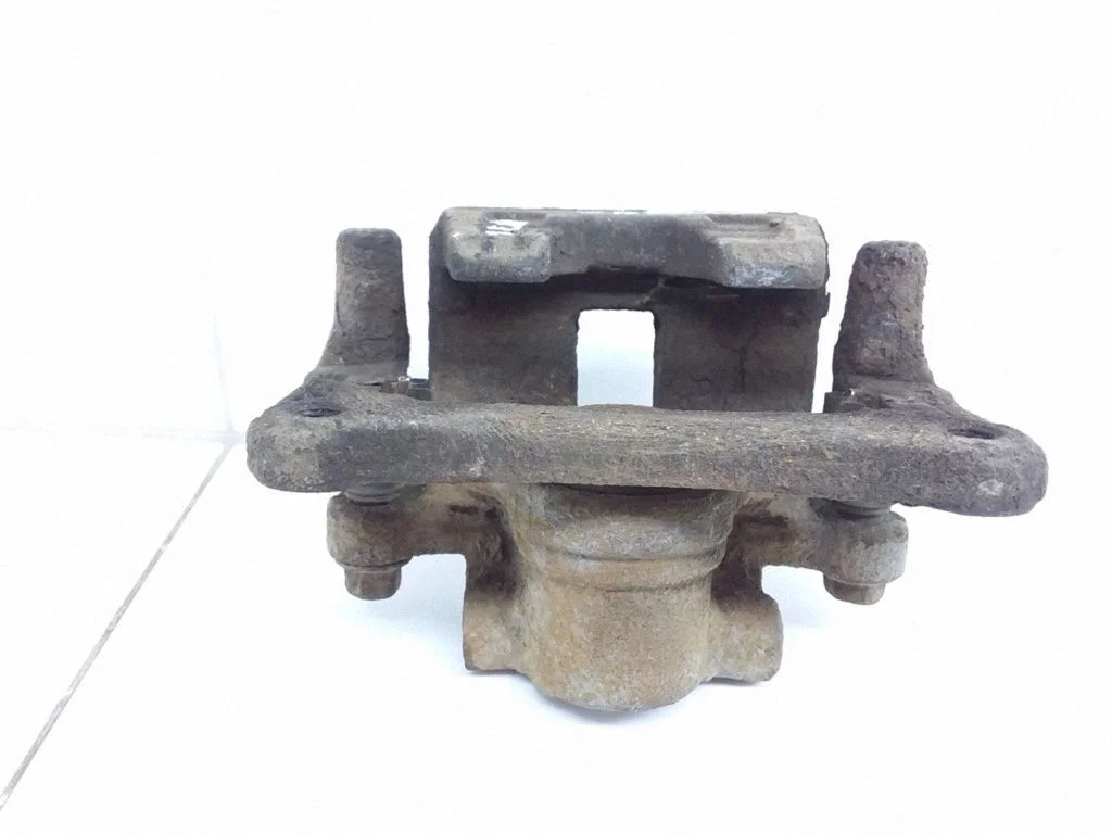 Rear brake caliper – left