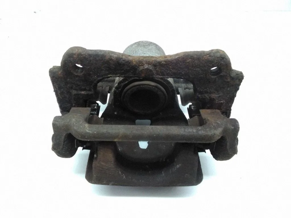 Rear brake caliper – left