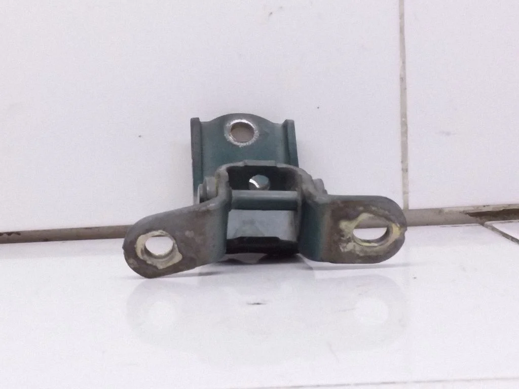 Front door upper hinge – right