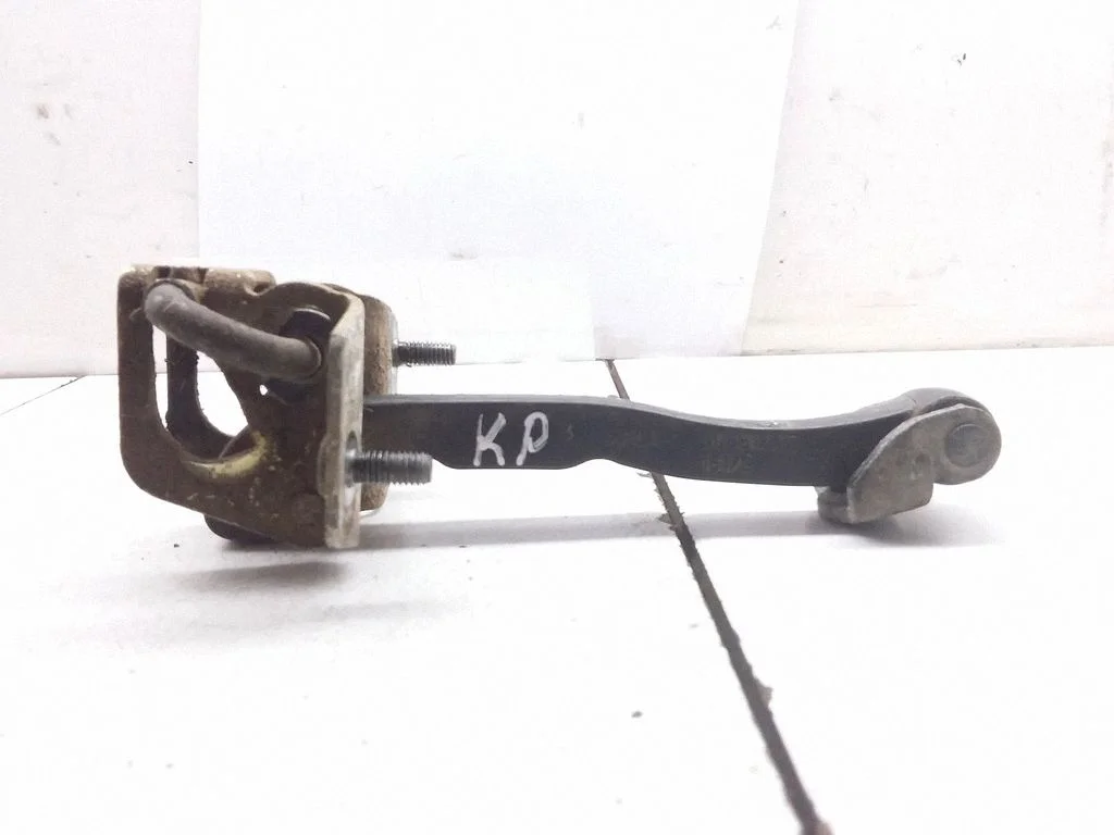Front door check strap stopper 30661442