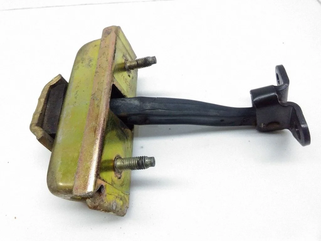 Front door check strap stopper 332CS97M