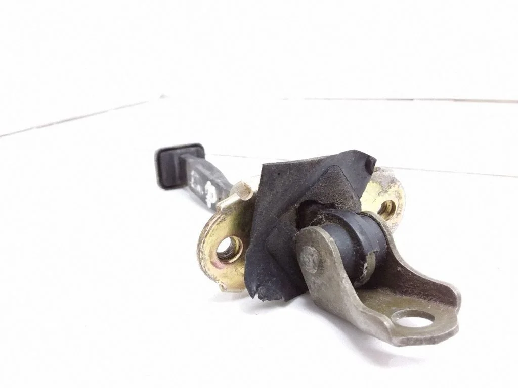 Front door check strap stopper – right