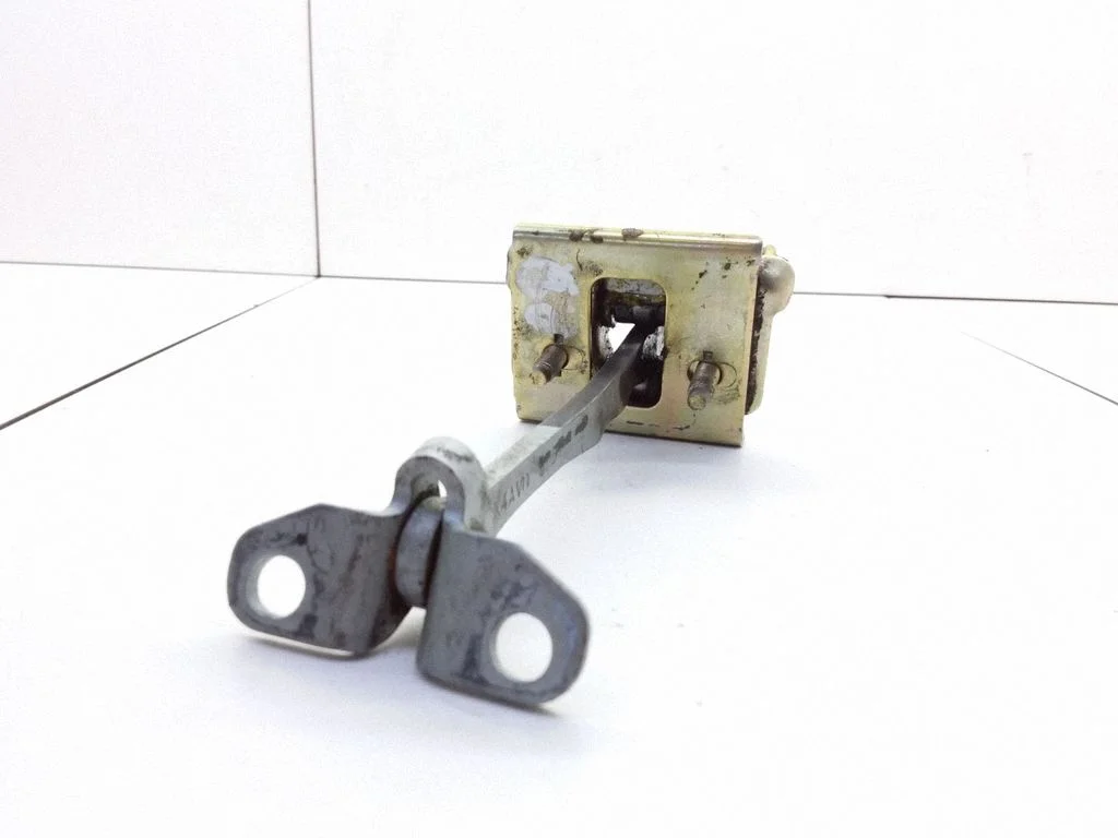 Front door check strap stopper AVG11304