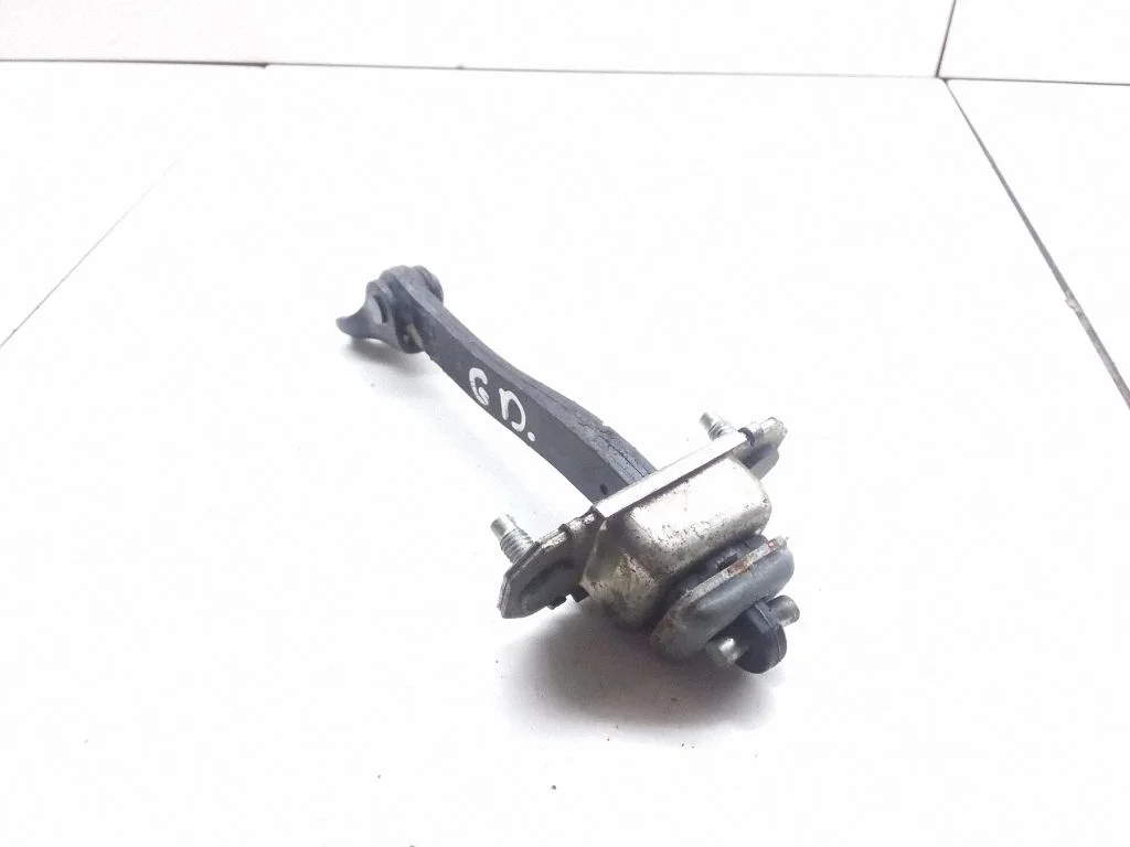 Rear door check strap stopper – rear right