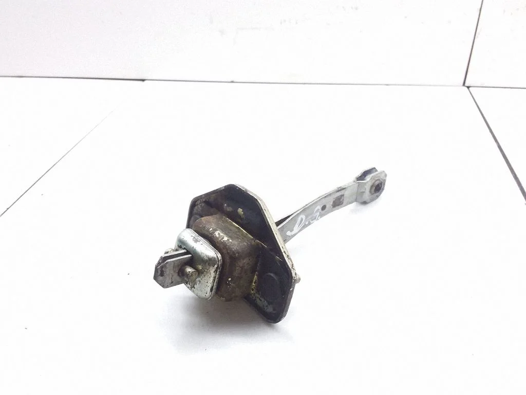 Rear door check strap stopper – Subaru Legacy (1990-1998)