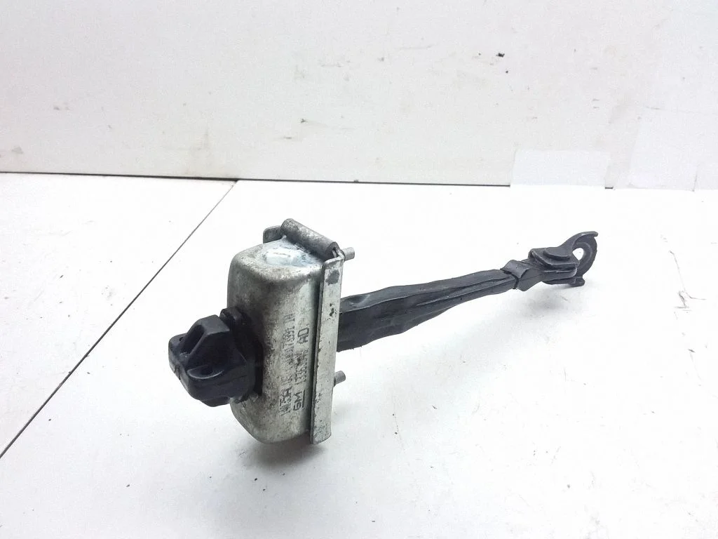 Rear door check strap stopper – Opel Astra J (2010-2015)