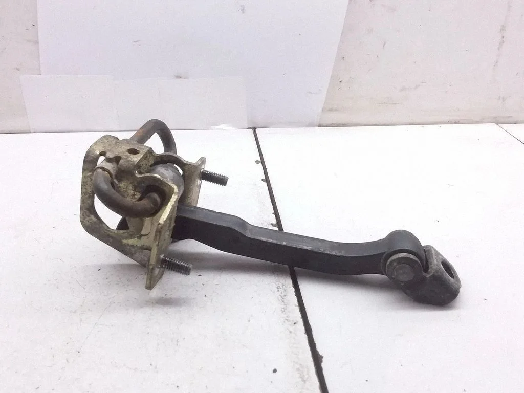 Rear door check strap stopper – Volvo V50 (2004-2007)