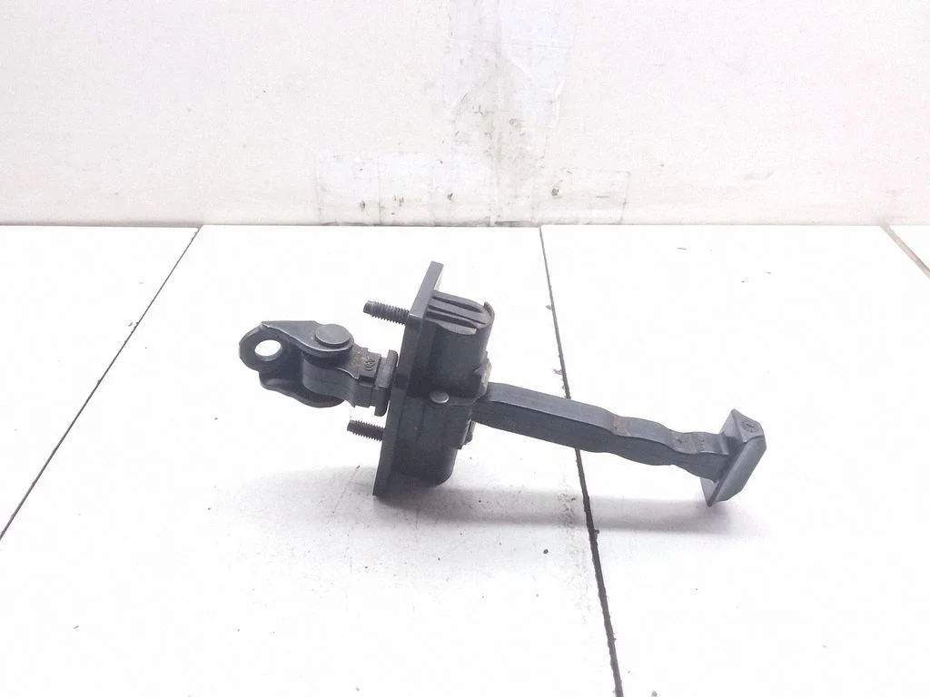 Rear door check strap stopper – right