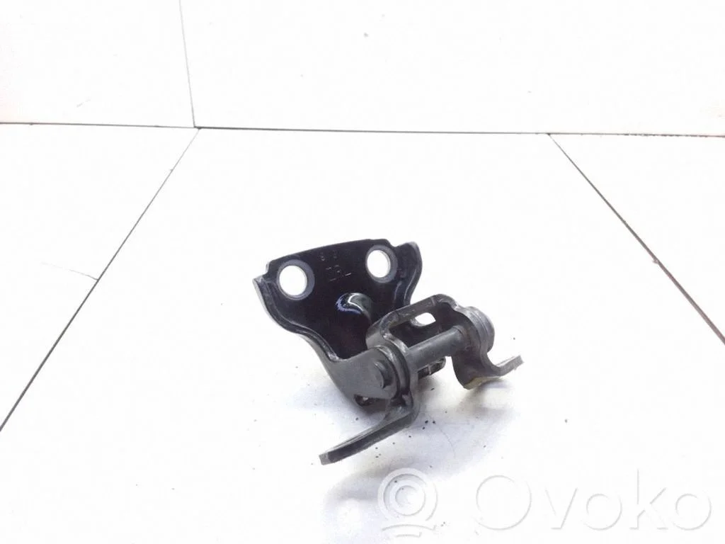Rear door upper hinge – left