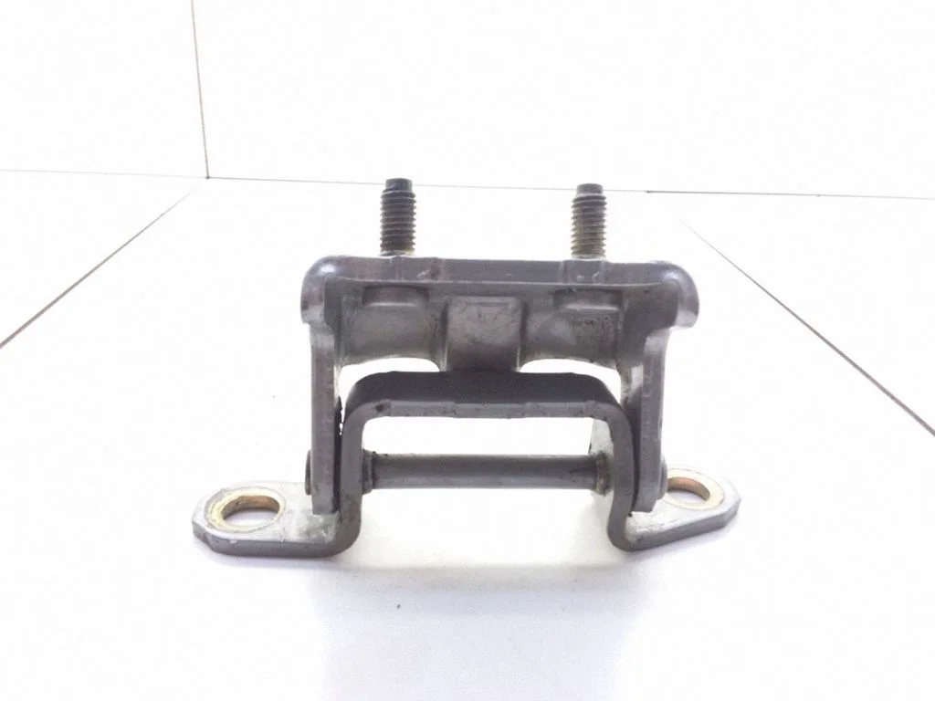 Rear door upper hinge – left