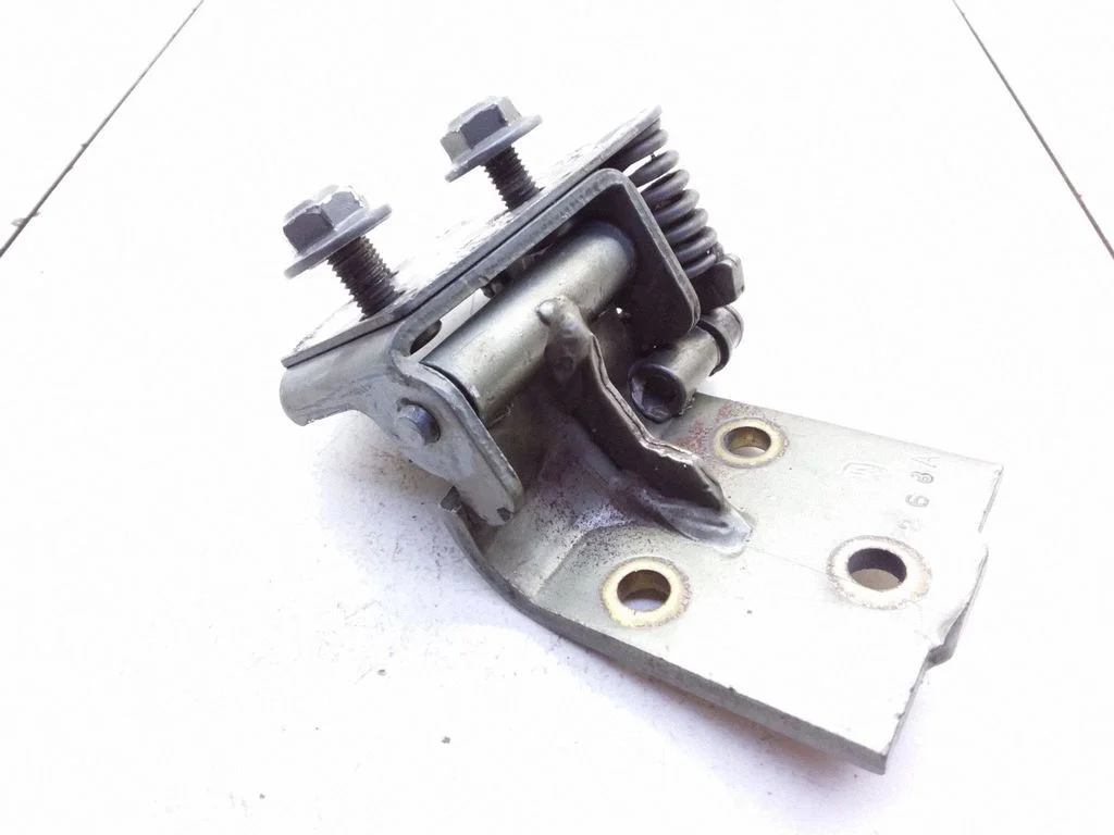 Rear door upper hinge
