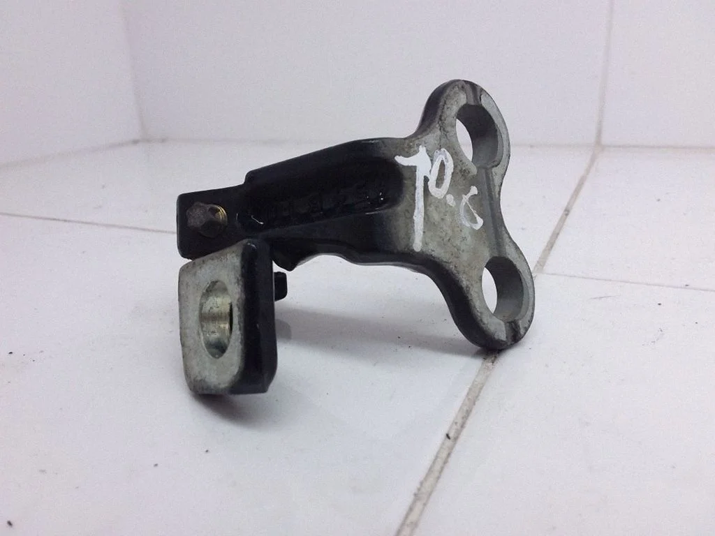 Rear door upper hinge – right