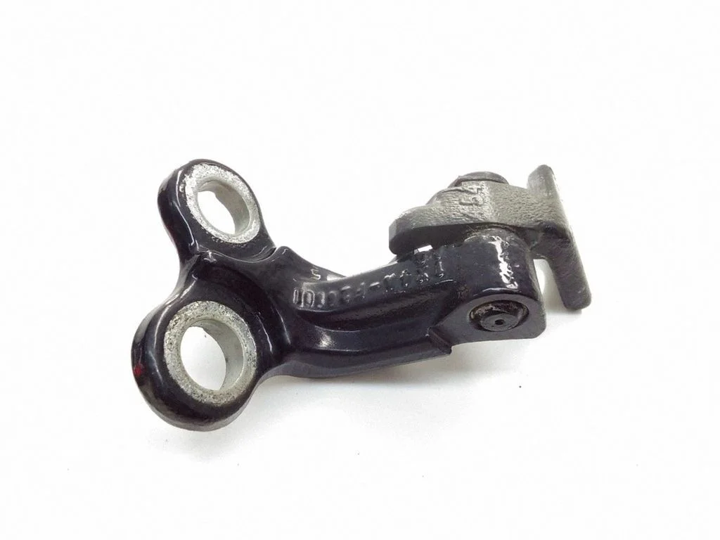 Rear door upper hinge – left