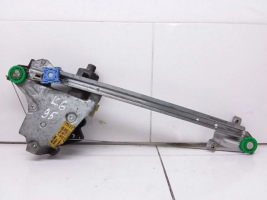 Rear door window regulator with motor 5184858