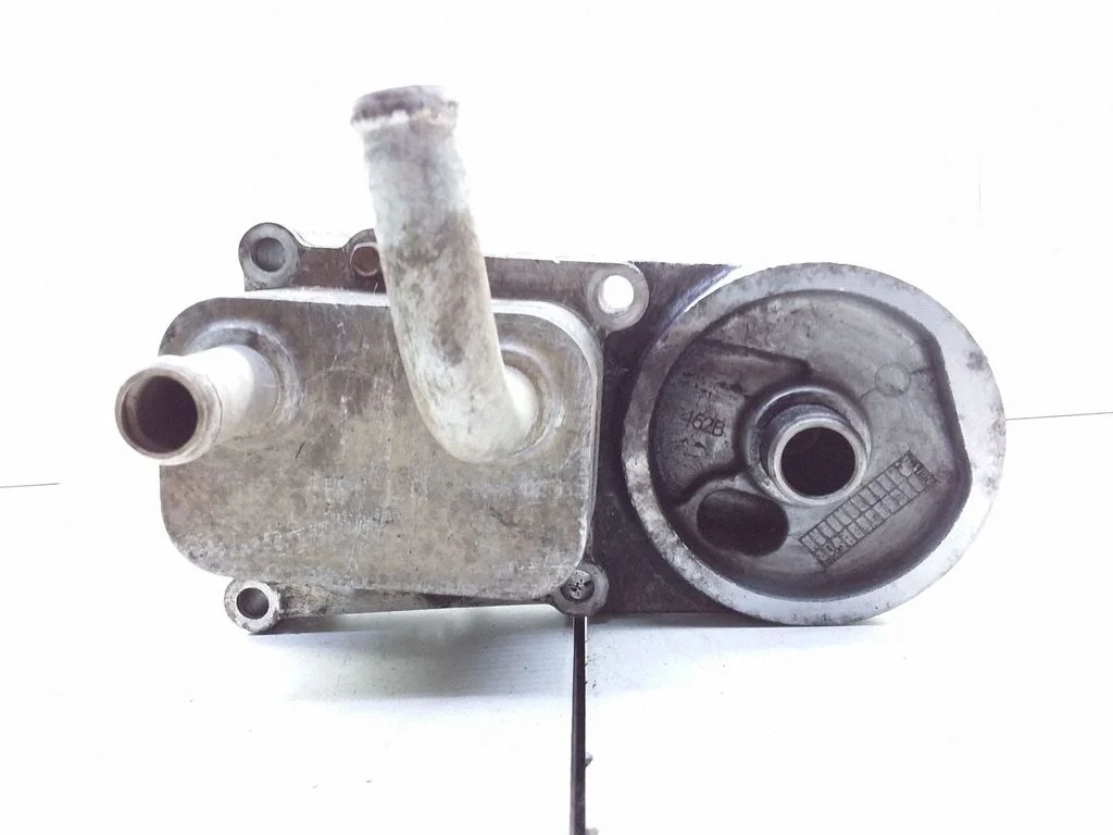 Oil filter mounting bracket YS6Q6A642BA