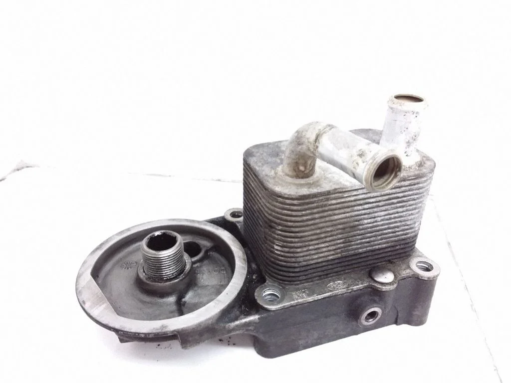 Oil filter mounting bracket 2M5Q6L686AB