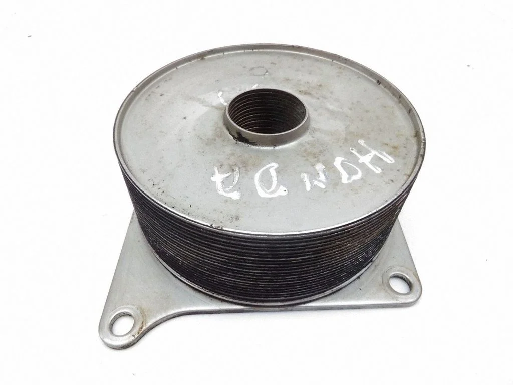 Oil filter mounting bracket