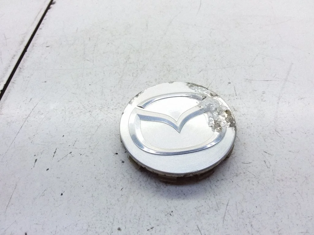 R12 wheel hub/cap/trim – Mazda 626 (1992-1997)