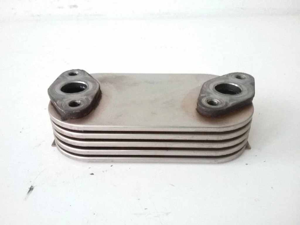 Oil filter mounting bracket