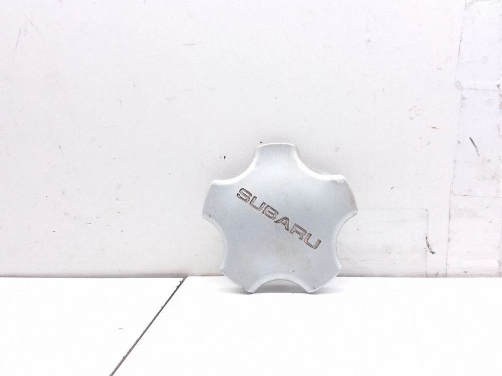 Oriģināls riteņa rumbas vāciņš (-i) – Subaru Legacy (1990-1998)